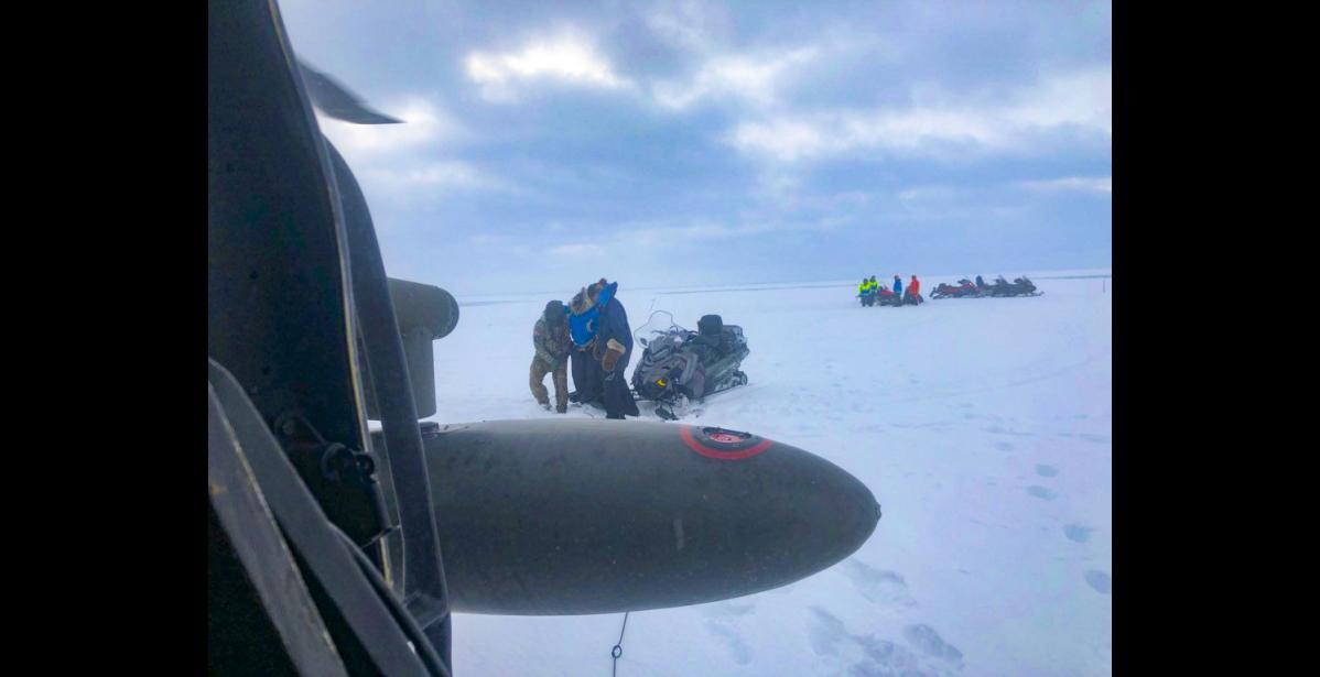 Photo courtesy Alaska Army National Guard An Alaska Army National Guard UH-60 Black Hawk helicopter aircrew performed a search and rescue mission for three Iditarod mushers about 25 miles east of Nome, March 20, 2020. The mushers and their dogs went through Bering Sea flood waters on the race trail and were wet and freezing. The aircrew transported two firefighter emergency medical technicians and Iditarod dog handlers to assist. The mushers were flown to Nome and transported to a local hospital. A local search and rescue team helped race dog handl