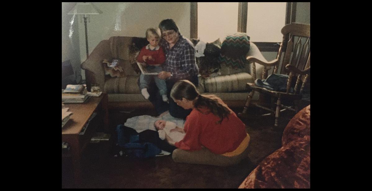 Photo courtesy Reba Lean SHE LOVED KIDS— Nancy McGuire holds young Andy Lean while Mikey Lean tends to baby Reba.
