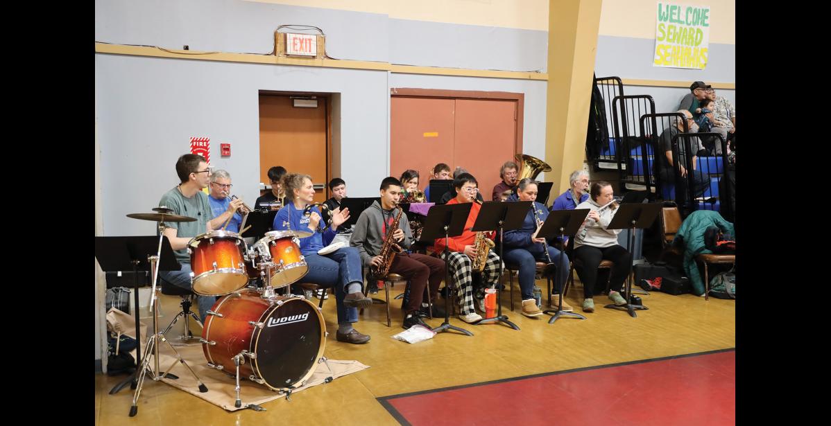 Photo by Anna Lionas PEP BAND- The Nome Community Pep Band organized by Angela Hansen kept the energy at the Rec Center high during Ruckus at the Rec.