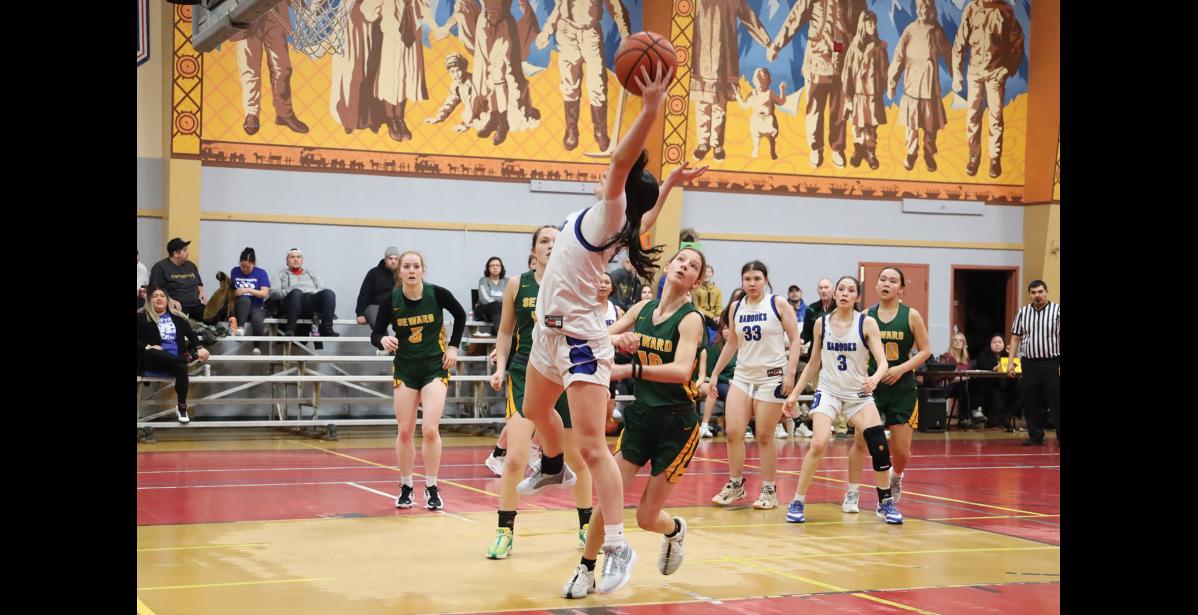 Photo by Anna Lionas CAUGHT IT!- BrookLynn Crowe leaps up to catch a rebound.