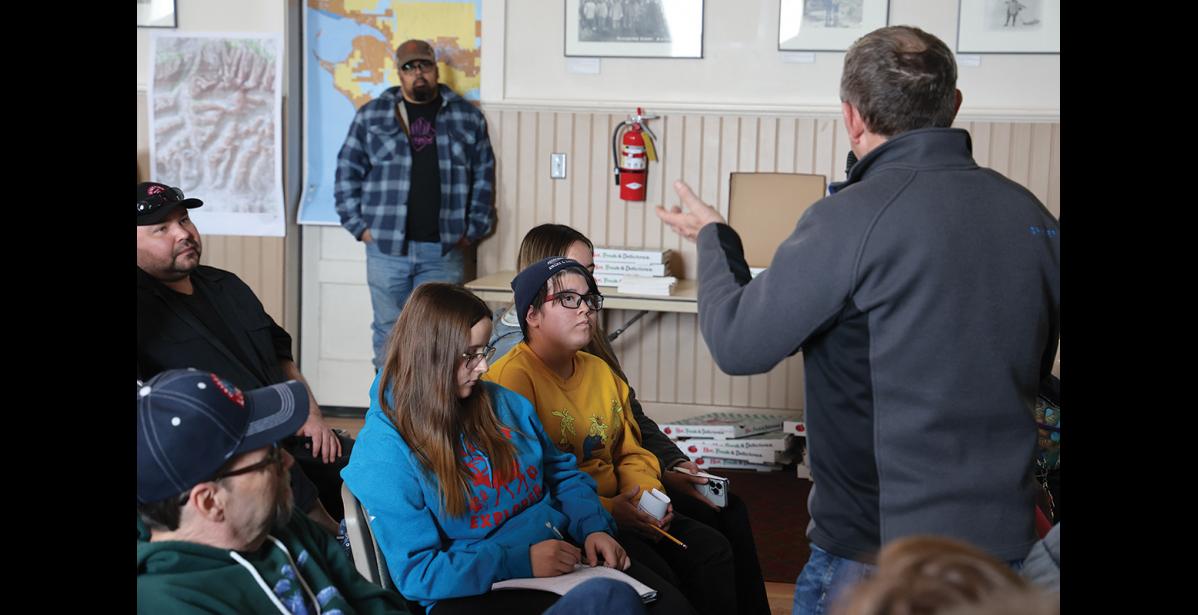 Photo by Anna Lionas MEETING— G1 Senior Vice President of Mining Mike Shaffner addresses a comment from the audience during the Monday, April 22 meeting at Old St. Joe’s in Nome.