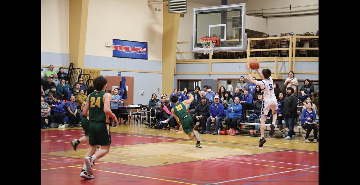 Photo by Anna Lionas JUMP SHOT- Orson Hoogendorn jumps up to shoot a basket.