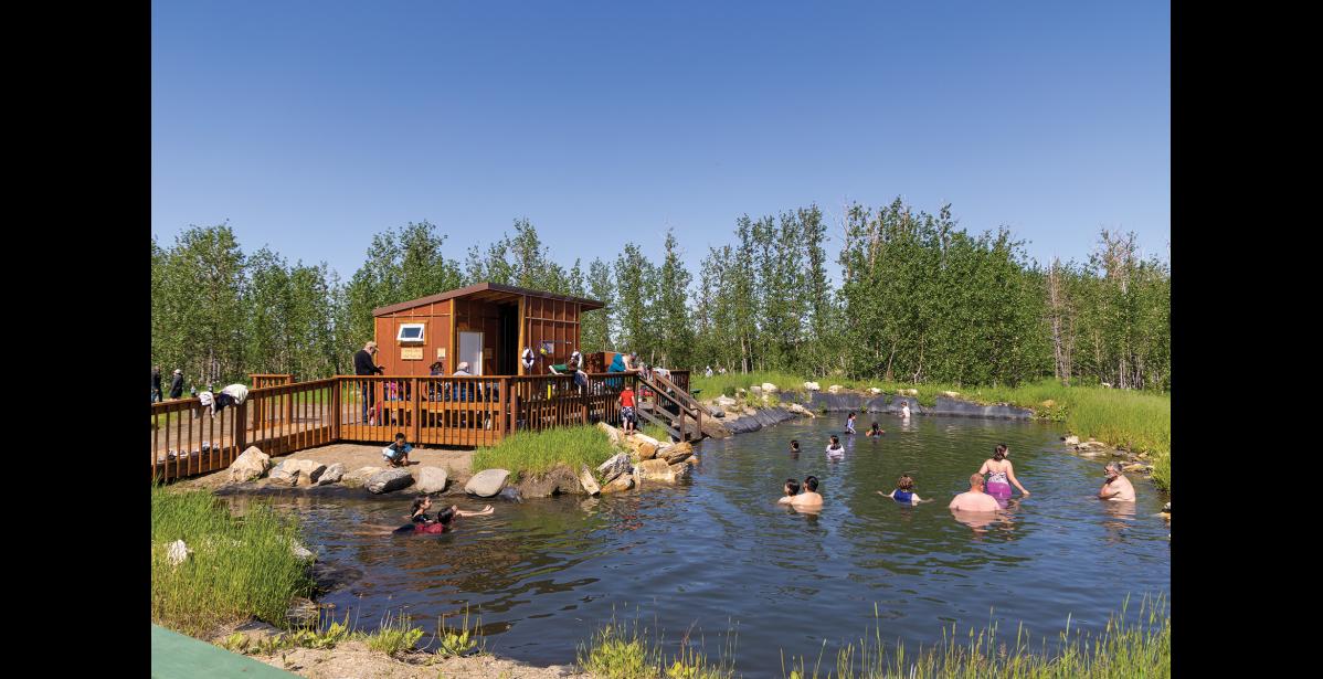 Photo by Anna Lionas SOAK TIME— Many people enjoyed the hot spring pool last weekend during the Pilgrim Hot Springs Mini Festival, held June 29.