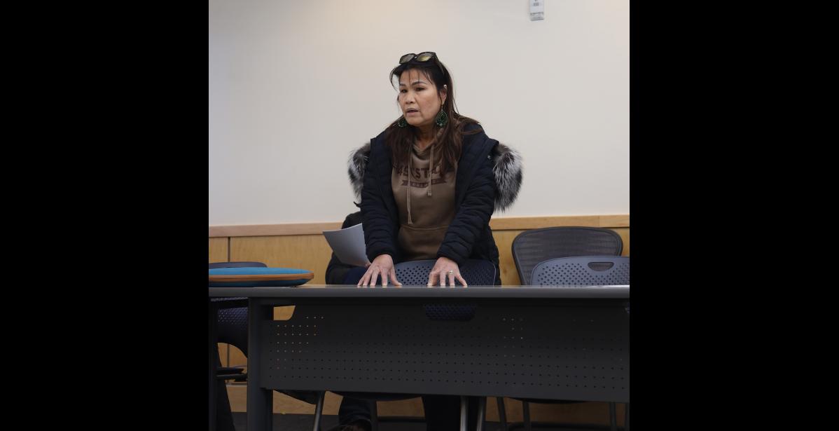 Photo by Anna Lionas SPEAKING UP— Trinh Johnson addresses the Public Safety Advisory Commission with her concerns on the Nome Police Department on Monday April 2.