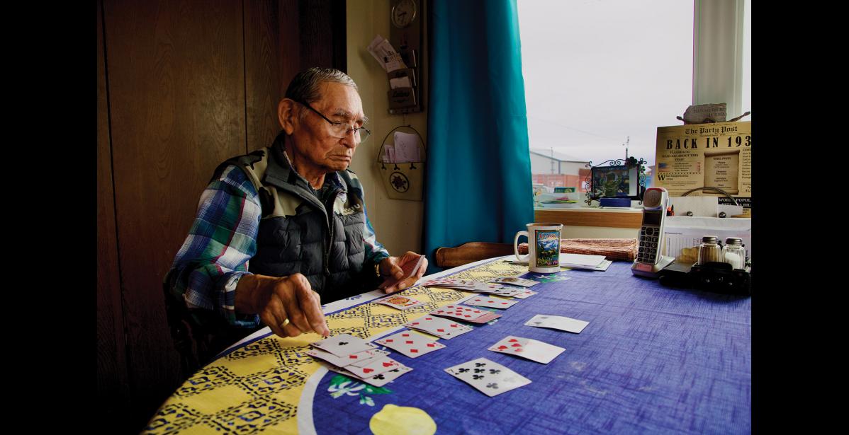Photo by Jenni Monet EYEWITNESS TO HISTORY— Orville Ahkinga Sr., 89, who grew up on Little Diomede and now lives in Nome. As a boy, he remembers his parents blacking out any light that might escape from the family window at the start of World War II.