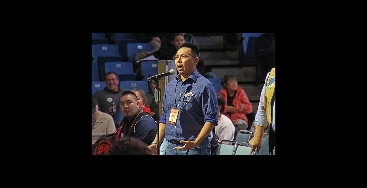 Photo by Julie St. Louis CLIMATE CHANGE RESOLUTION—Esau Sinnok speaks passionately in support of the Youth and Elders climate change resolutions at AFN.