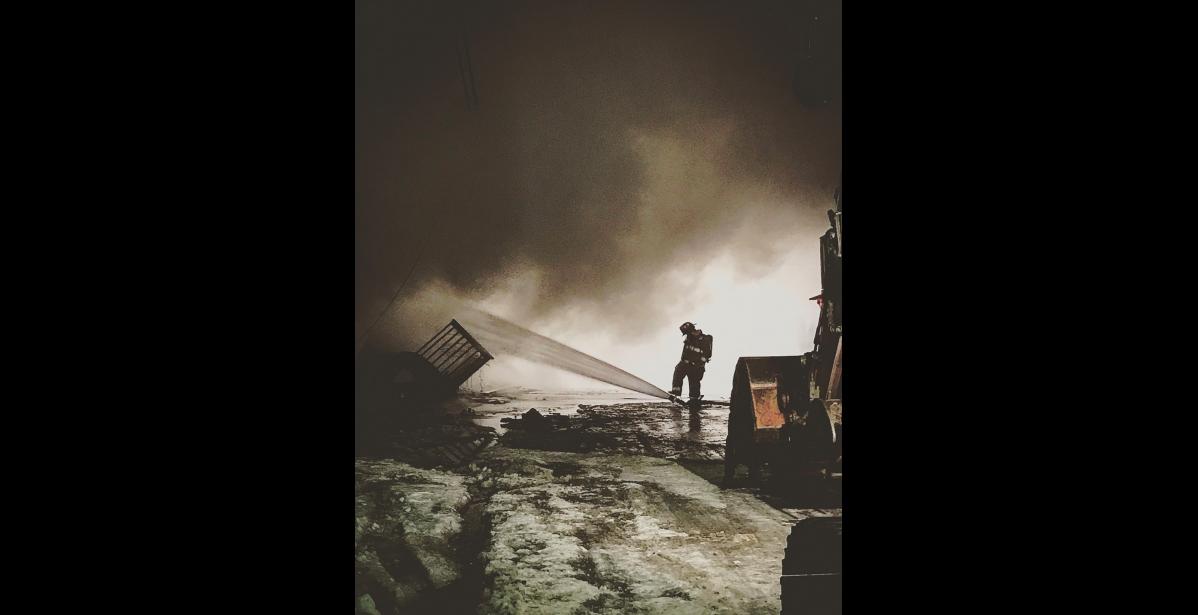 Photo by Jenny Mills FIGHTING THE FLAMES— A NVFD volunteer battles the Polaris fire last week.