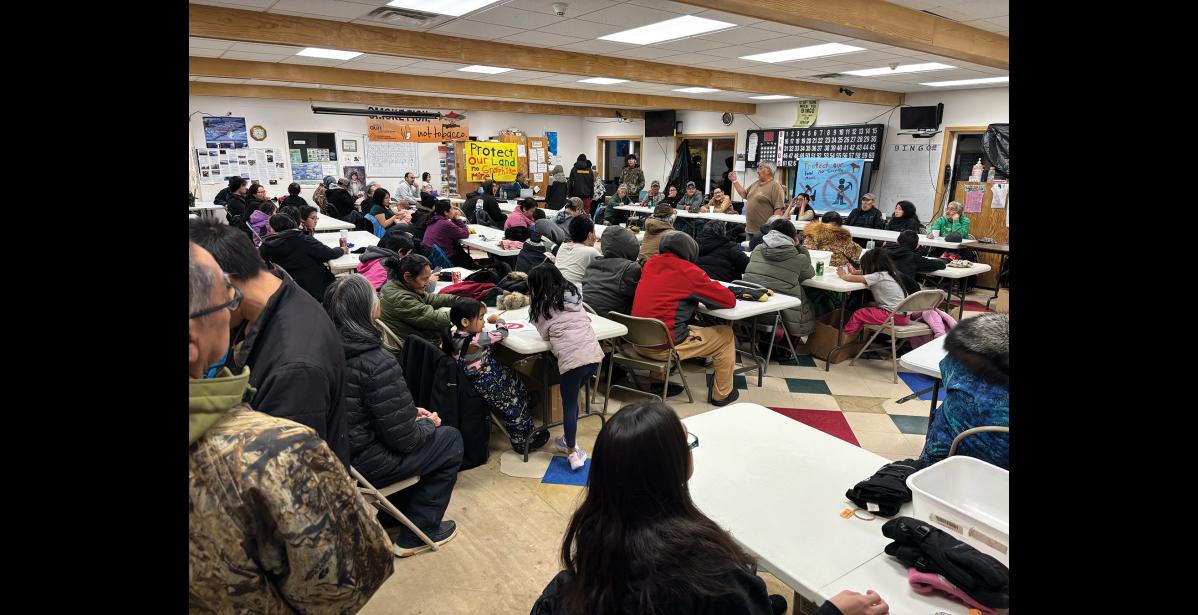 Photo by Keith Conger PACKED COMMUNITY HALL – Residents of Brevig Mission listened to subsistence hunter and fisherman Elmer Seetot Jr. as he expressed concern about Graphite One’s potential adverse effects to water and land, on Wednesday, November 12.