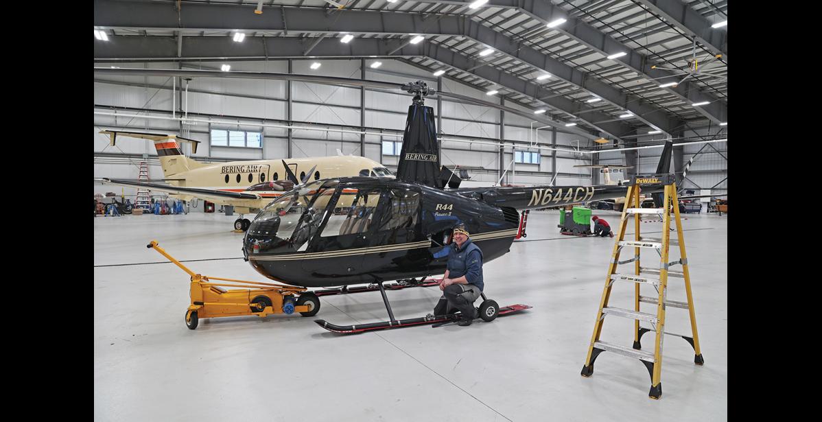 Photo by Megan Gannon LONGTIME EMPLOYEES — Bering Air facilities manager Chris Shannon has been with the company for 21 years. “It's kind of like a big family,” he says.
