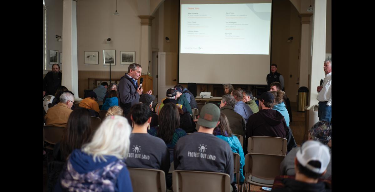Photo by Nils Hahn MEETING— G1 Senior Vice President of Mining Mike Shaffner addresses a comment from the audience during the Monday, April 22 meeting at Old St. Joe’s in Nome.
