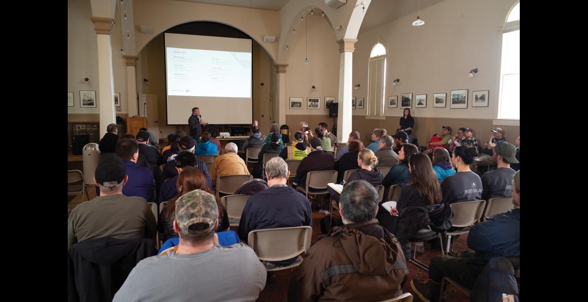 Photo by Nils Hahn MEETING— G1 Senior Vice President of Mining Mike Shaffner provides updates of Graphite One mining plans during the Monday, April 22 meeting at Old St. Joe’s in Nome.