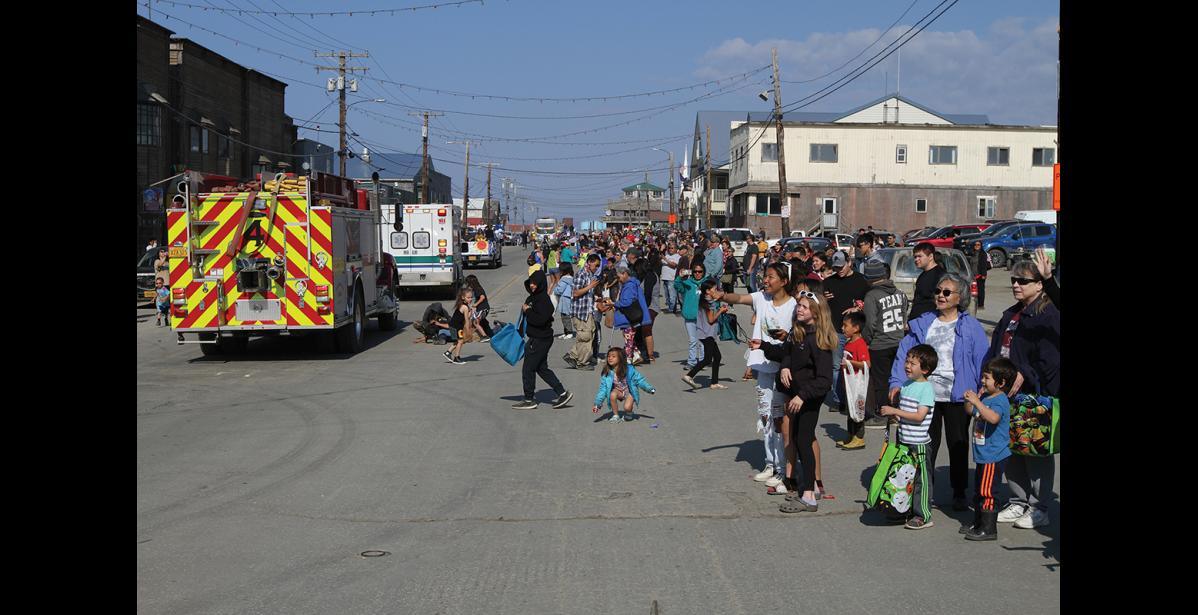 Photo by Peter Loewi PARADE—Warm and sunny weather graced Saturday’s Midnight Sun Parade, drawing a large crowd looking for fun, games and candy.