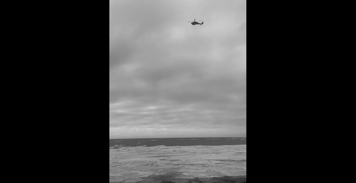 Photo by Peter Loewi A Black Hawk cruising over Nome last week.