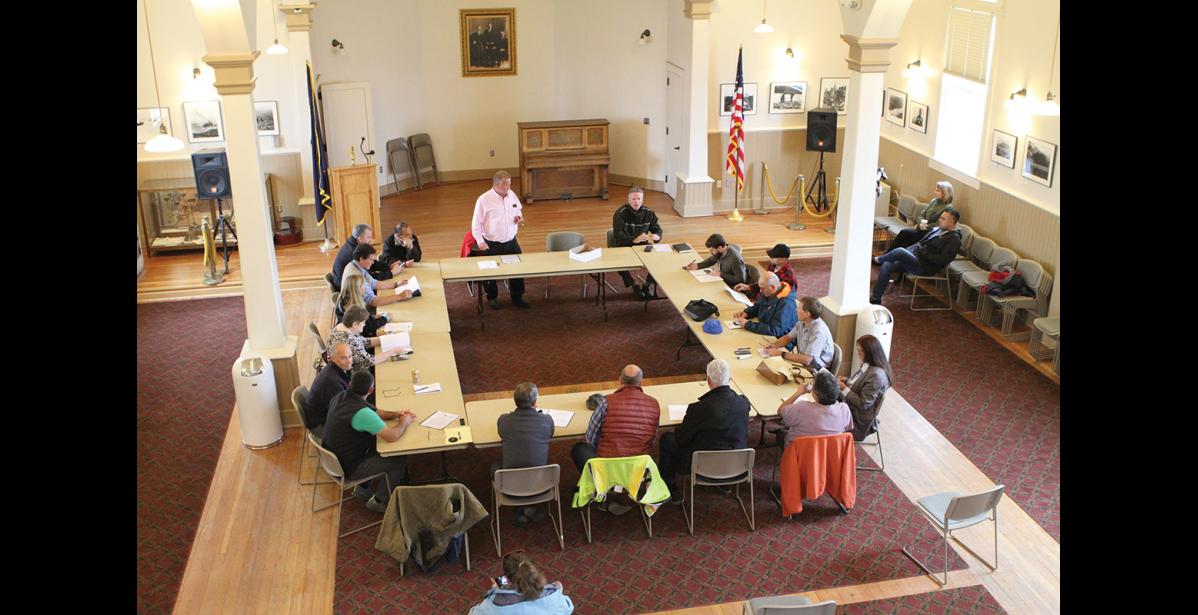 Photo by Peter Loewi ENERGY ROUND TABLE— Governor Mike Dunleavy listens to a community discussion on a NJUS report on energy needs, at Old St. Joe’s during his visit to Nome on Friday, August 5.