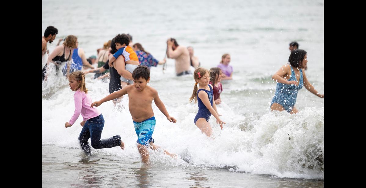 Photo by Sarah Manriquez Participants sprinted into the Bering Sea for the 2025 Polar Bear Plunge on Saturday, June 21st 2025.