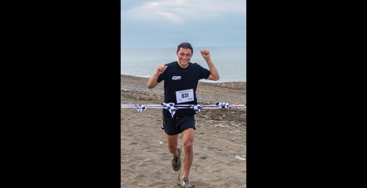 Photo by Sarah Manriquez Wilson Hoogendorn crosses the finish line in first place with a time of 24 minutes and 39 seconds in the Gold Dust Dash 5K on Saturday, June 21, 2025.
