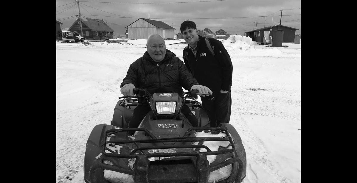 Photo by Sue Steinacher HOUSING CRUNCH IN THE REGION— Savoonga Tribal Vice President Larry Kava visits with Alaska Coalition of Housing and Homelessness Brian Wilson in Savoonga on Thursday April 27.