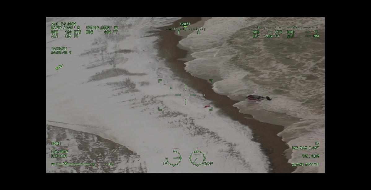 Photo courtesy U.S. Coast Guard photo by Air Station Kodiak A Coast Guard C-130 Hercules aircraft forward-looking infrared camera captures an 18-foot boat stuck on Sinuk River near Nome, Alaska, Oct. 29, 2021. The C-130 crew were notified of overdue boaters location and dropped a pump can with survival gear and a radio.