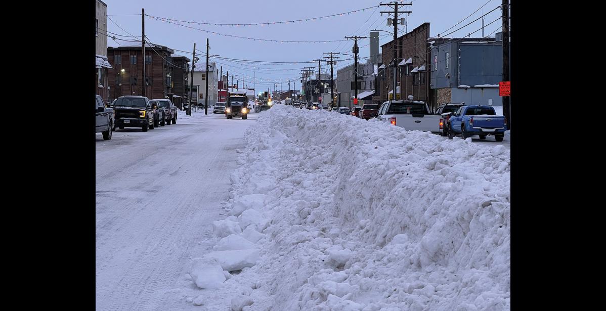 Photo by Diana Haecker WALLS OF SNOW— DOT and city crews were busy clearing the town’s roads after a week of snow, wind and more snow.