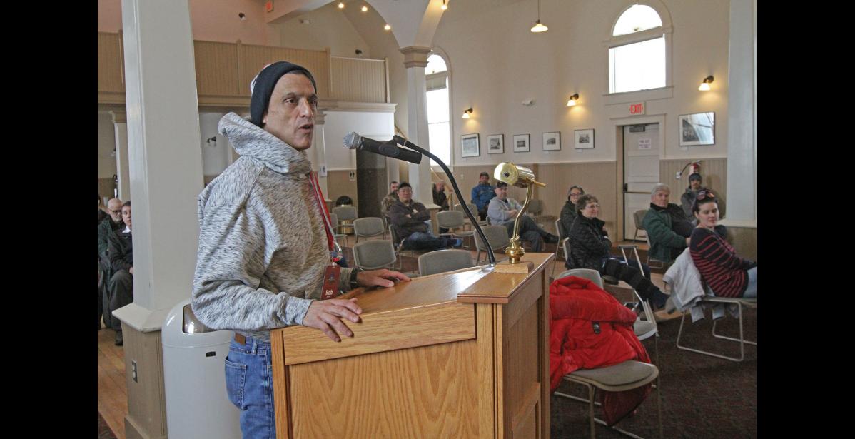 Photo by Diana Haecker Iditarod CEO Rob Urbach addresses the Nome Common Council in an emergency meeting at Old St. Joe's on March 17, 2020.