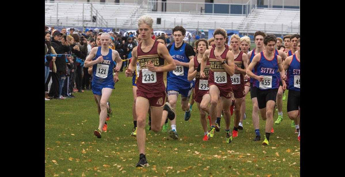 Photo by James Mason START FAST – The Division II boys charge away from the start line in the Alaska State High School XC Championships Saturday at Bartlett High School. Nome Nanook Orson Hoogendorn, third from left, finished in fifth place.