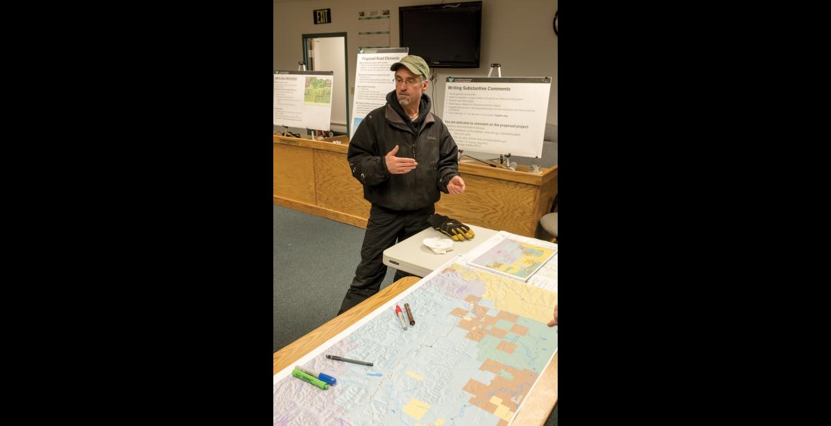 Photo by James Mason OPPOSED— Seth Kantner, who was raised near Ambler, discusses the implications of building a road into the region.