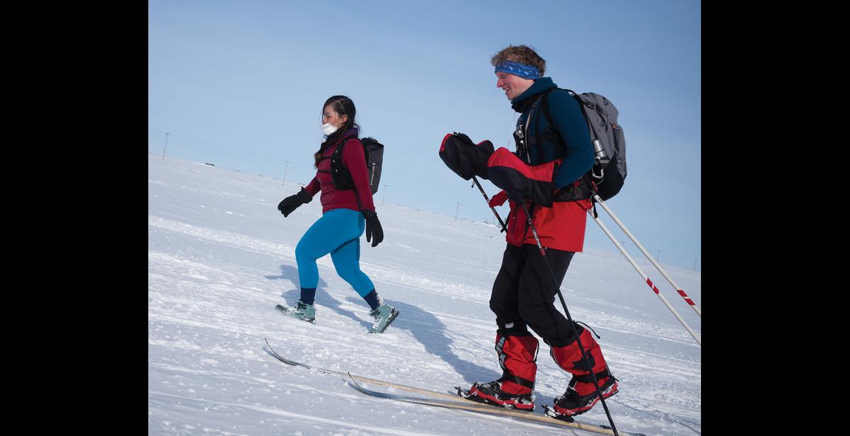 Photo by James Mason THE COLD TRAIL – Carol Seppilu and Max Romey make their way toward Nome from Safety on Saturday.