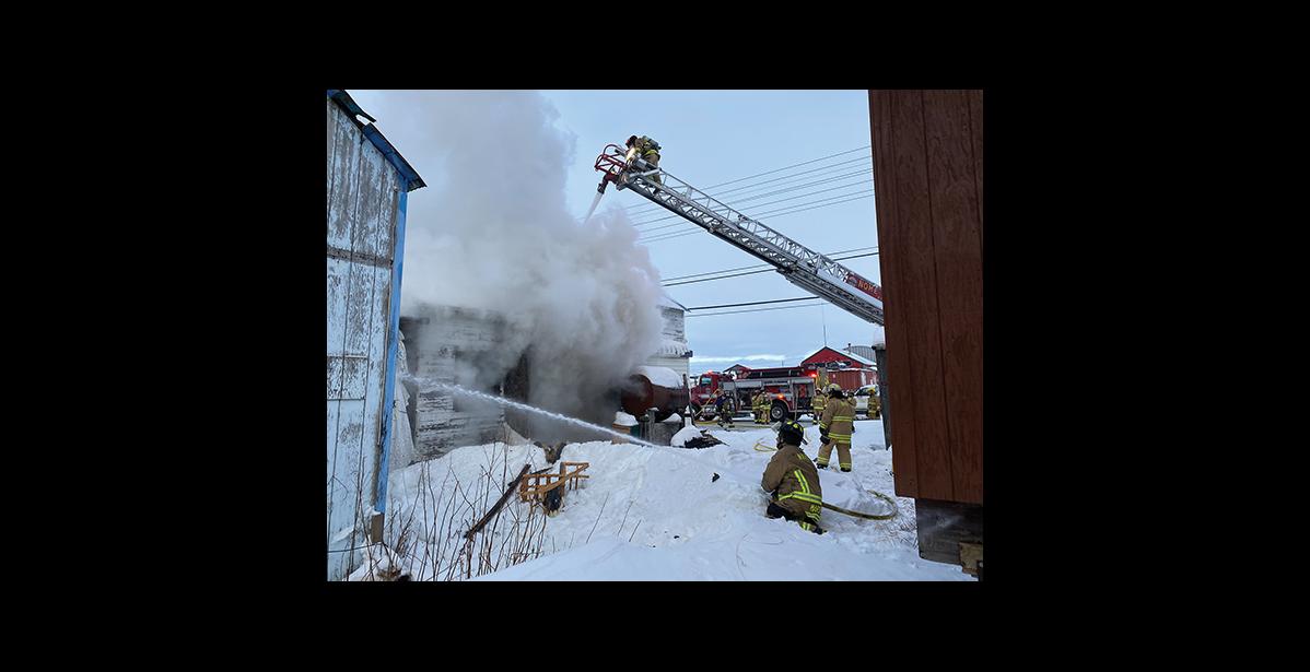 Photo by James Mason HOUSE FIRE— Nome Volunteer Fire Dept. spent four hours extinguishing a house fire on Seppala Dr. on Wednesday, January 20. Nobody was hurt in the fire.
