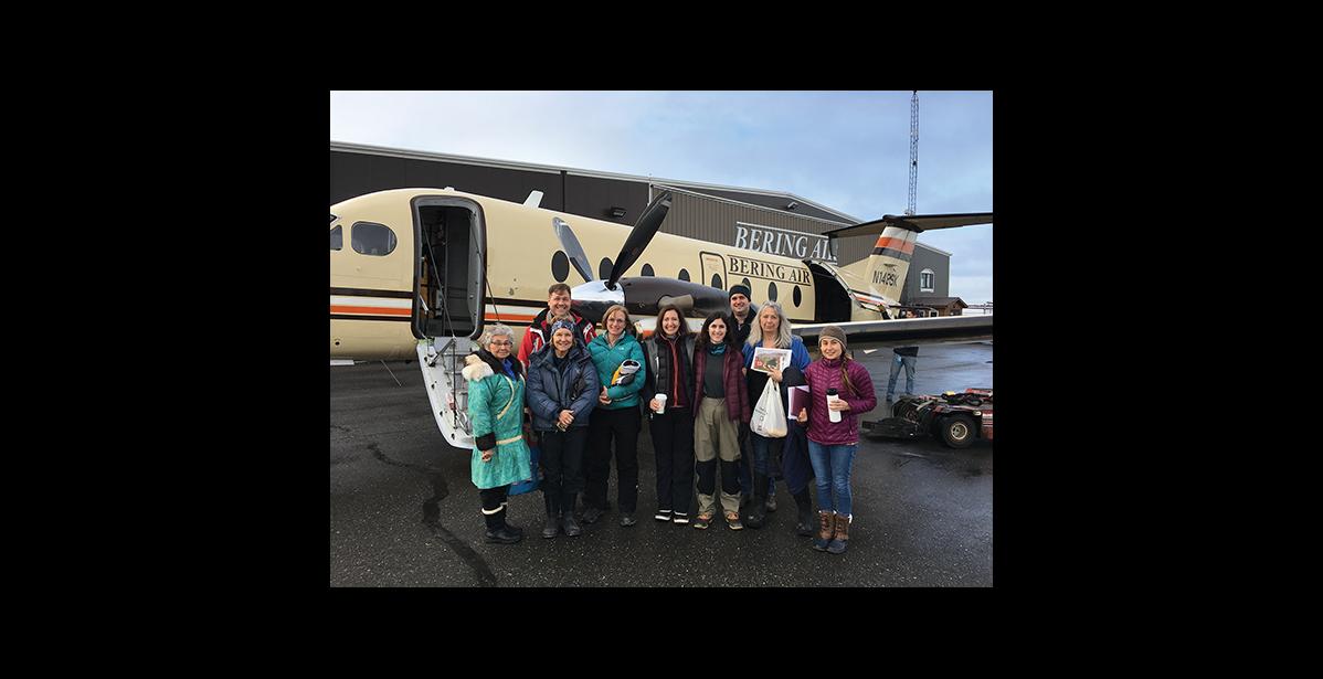 Photo courtesy Sue Steinacher Representatives from HUD and other housing agencies spent a day in Nome and then flew to Savoonga to look at housing conditions there. From left they are Carol Piscoya of Kawerak, Coleen Bickford, Jeff McMorris, Carma Reed, Katy Miller, Lindsay Knots, Brian Wilson, Sue Steinacher of NEST and Megan Alvanna-Stimpfle, Principal Strategist Arctic Geopolitical Consulting.