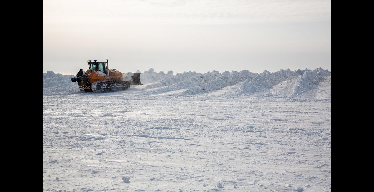 Photo by James Mason HEAPS OF SNOW— The city's snowdump fills up with lots of snow removed from Nome's streets.