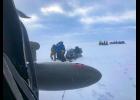 Photo courtesy Alaska Army National Guard An Alaska Army National Guard UH-60 Black Hawk helicopter aircrew performed a search and rescue mission for three Iditarod mushers about 25 miles east of Nome, March 20, 2020. The mushers and their dogs went through Bering Sea flood waters on the race trail and were wet and freezing. The aircrew transported two firefighter emergency medical technicians and Iditarod dog handlers to assist. The mushers were flown to Nome and transported to a local hospital. A local search and rescue team helped race dog handl