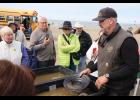 Photo by Colin Warren GOLD – Augie Krutzsch, owner of Alaska Gold & Resort, demonstrates panning techniques to cruise ship guests, on Friday, June 21.