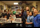 Photo by Colin Warren WE’RE FOR MARY— Nomeites gather to question and support Alaska’s first Native congresswoman Mary Peltola, right, at Milano’s Pizzaria on Tuesday, July 2, 2024.