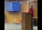 Photo by Anna Lionas ZONING— City Planner Erin Reinders leads a discussion on the rezoning of Front Street during the Planning Commission work session on January 9.