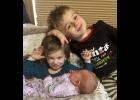 Verena Violet Naaktgeboren is welcomed home by big brother Robert Villella, 5, and big sister Persephone Naaktgeboren, 2.