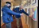 Photo by Julia Lerner Nomeite Lew Tobin, left, discusses a map proposal with Redistricting Board member Budd Simpson, during Monday’s public meeting at Old St. Joe’s.
