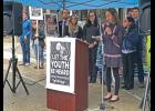Photo by Julie St. Louis HEAR THE YOUTH—Summer Sagoonick tells the audience gathered outside the Boney Courthouse after a court hearing in Anchorage on Wednesday about climate change impacts on her family and village.