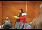 Photo by Megan Gannon TESTIMONY — Melanie Bahnke speaks during a public meeting with BLM on protections for D-1 lands on Thursday, February 1 at the Mini Convention Center in Nome.