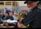 Photo by Megan Gannon GOLDEN HARNESS AWARD WINNER — Seavey showed some love to Golden Harness winner Aero, one of the lead dogs that got him to Nome.