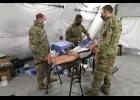 ARCTIC EAGLE— Lieutenant Colonel Christopher Mahoney, Senior Airman Lamb and Lieutenant Colonel Erik DeSoucy demonstrate some of their tools, including “Billy” during the Alaska National Guard’s Arctic Eagle/Patriot 2022 exercise held in Nome