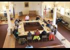 Photo by Peter Loewi ENERGY ROUND TABLE— Governor Mike Dunleavy listens to a community discussion on a NJUS report on energy needs, at Old St. Joe’s during his visit to Nome on Friday, August 5.