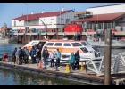 Passengers getting out of the tender boats, during Westerdam's visit to Nome in 2025. 