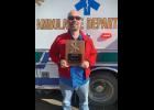 Photo courtesy Tom Vaden EMT OF THE YEAR— Ken Morton received the EMT of the Year award during last week’s National Night Out event at the Rec Center.