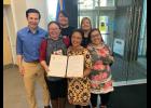 CONSENT BILL— Present at the ceremonial signing of HB 325 were (left to right) Rep. Neal Foster, Lisa Ellanna and her daugther Nivi Brandt of Nome, Juneau advocate Katie Botz, Rep. Geran Tarr and Panganga Pungowiyi. 