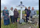Photo by Diana Haecker HELLO CENTRAL— The Beneville family came to Nome to place a headstone at Richard Beneville’s gravesite. Pictured are Shelly Pawlikowski, Leslie Absher, Susan Beneville, Michael and his son Maverick Beneville and Derrick Beneville.