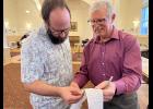 Photo by Diana Haecker ity Clerk Bryant Hammond and Election Judge Lloyd Perrigo look over election results on Tuesday, Oct. 3.