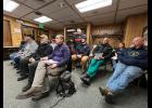 Photo by Diana Haecker AMBULANCE— Nome Volunteer Ambulance Department Chief Jim West Jr., standing, addresses the Nome Common Council as council members weighed their decision to retain or relinquish the ambulance service