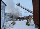 Photo by James Mason HOUSE FIRE— Nome Volunteer Fire Dept. spent four hours extinguishing a house fire on Seppala Dr. on Wednesday, January 20. Nobody was hurt in the fire.