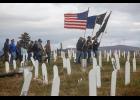 MEMORIAL DAY 2020 – Flag bearers and veterans make their way to the site of the Memorial Day service in Nome’s cemetery Monday. 