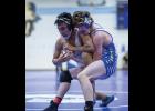 OUTSTANDING WRESTLER—Elden Cross wrestles his Kotzebue opponent in the 145-lbs championship match Saturday, which he won, during the Regional Wrestling Tournament, held in Nome last weekend. Cross was named Outstanding Wrestler. 
